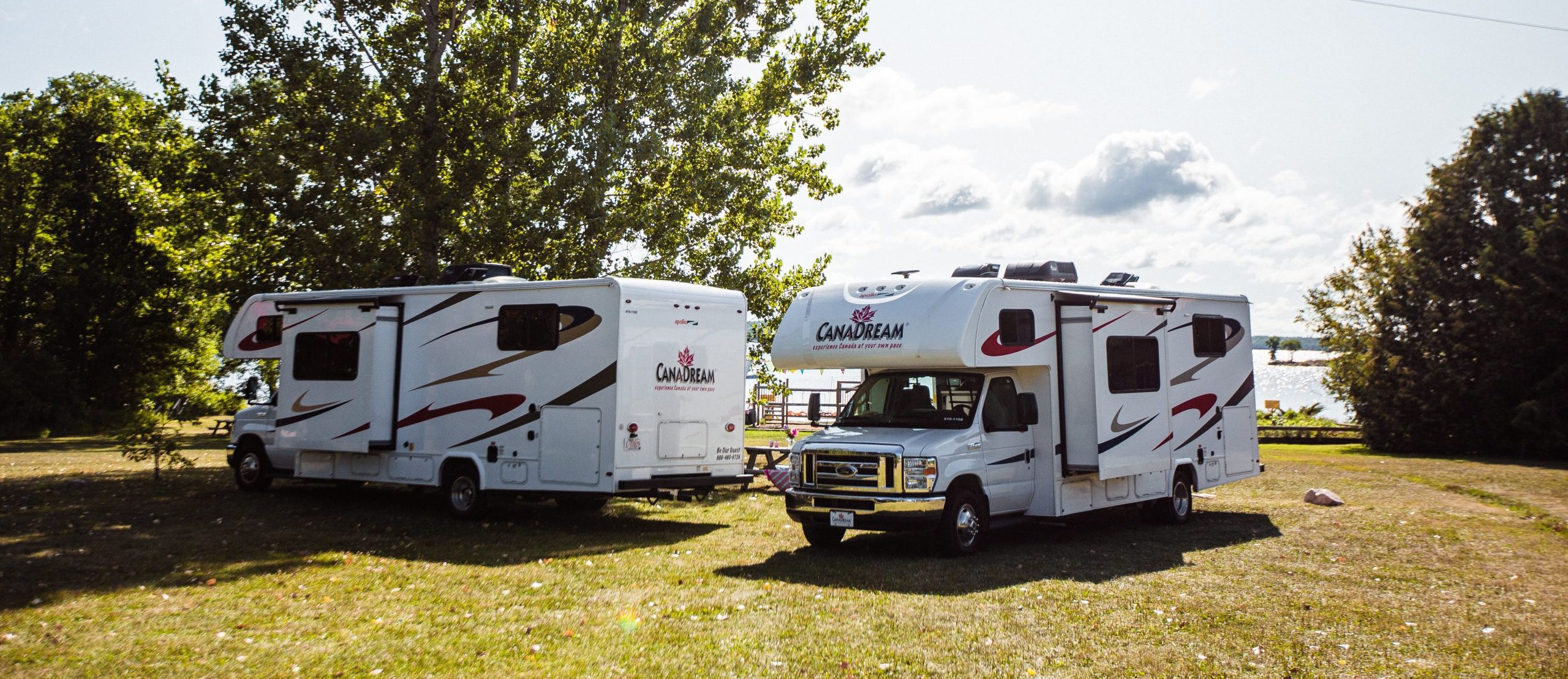 Two RVs at a camp site