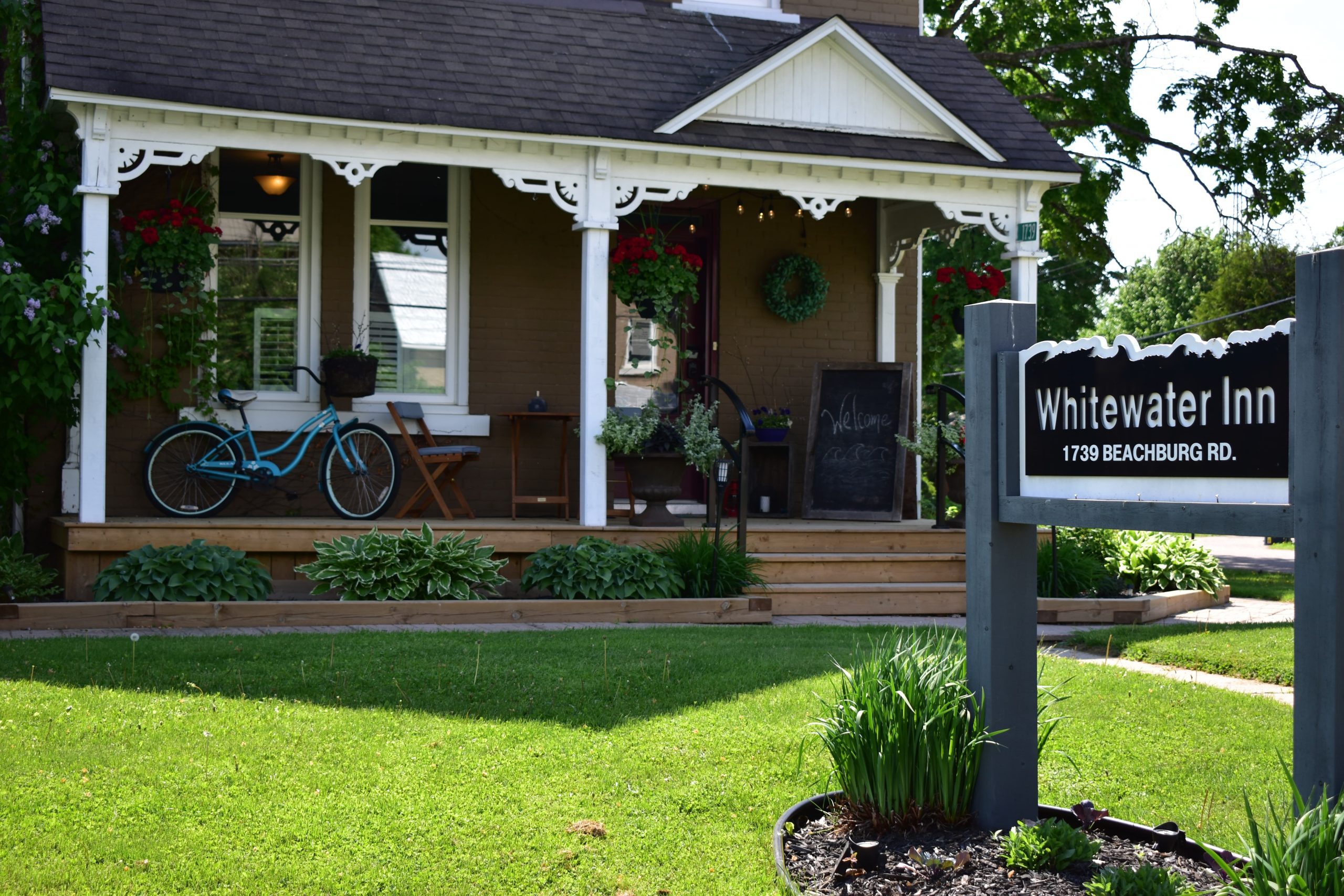 Whitewater Inn building and sign